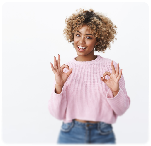 Smiling woman making an OK gesture